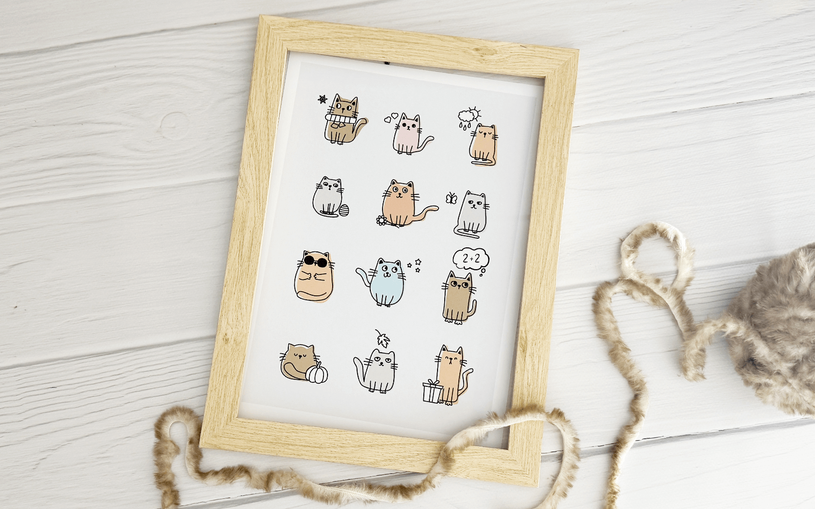 Plakat z 12 uroczymi kotami na Dzień Kota.